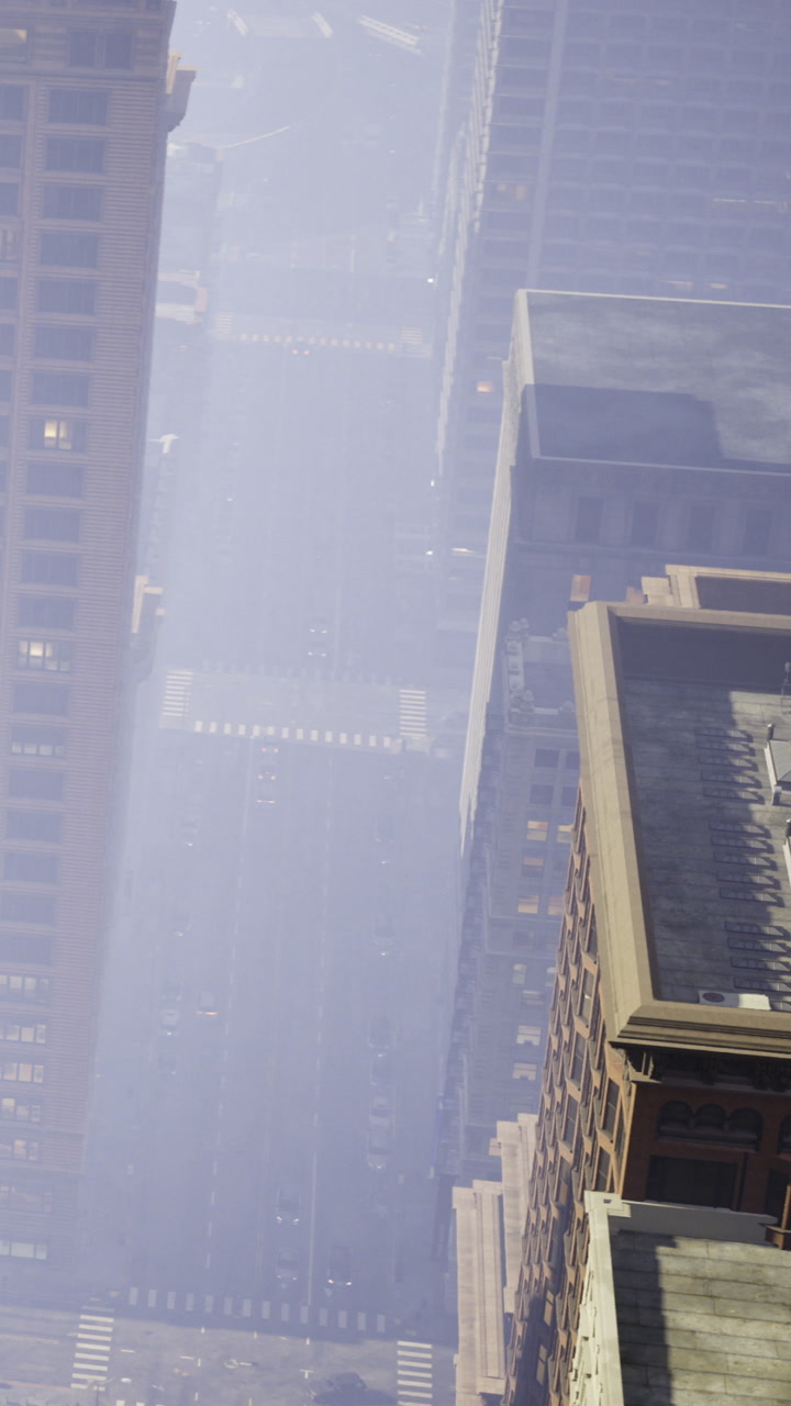 Urban skyline shrouded in soft morning fog over city streets