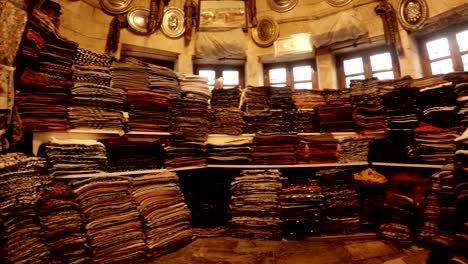 interior of ethnic shop with different kind fabric of  in courtyard of balikligol panorama