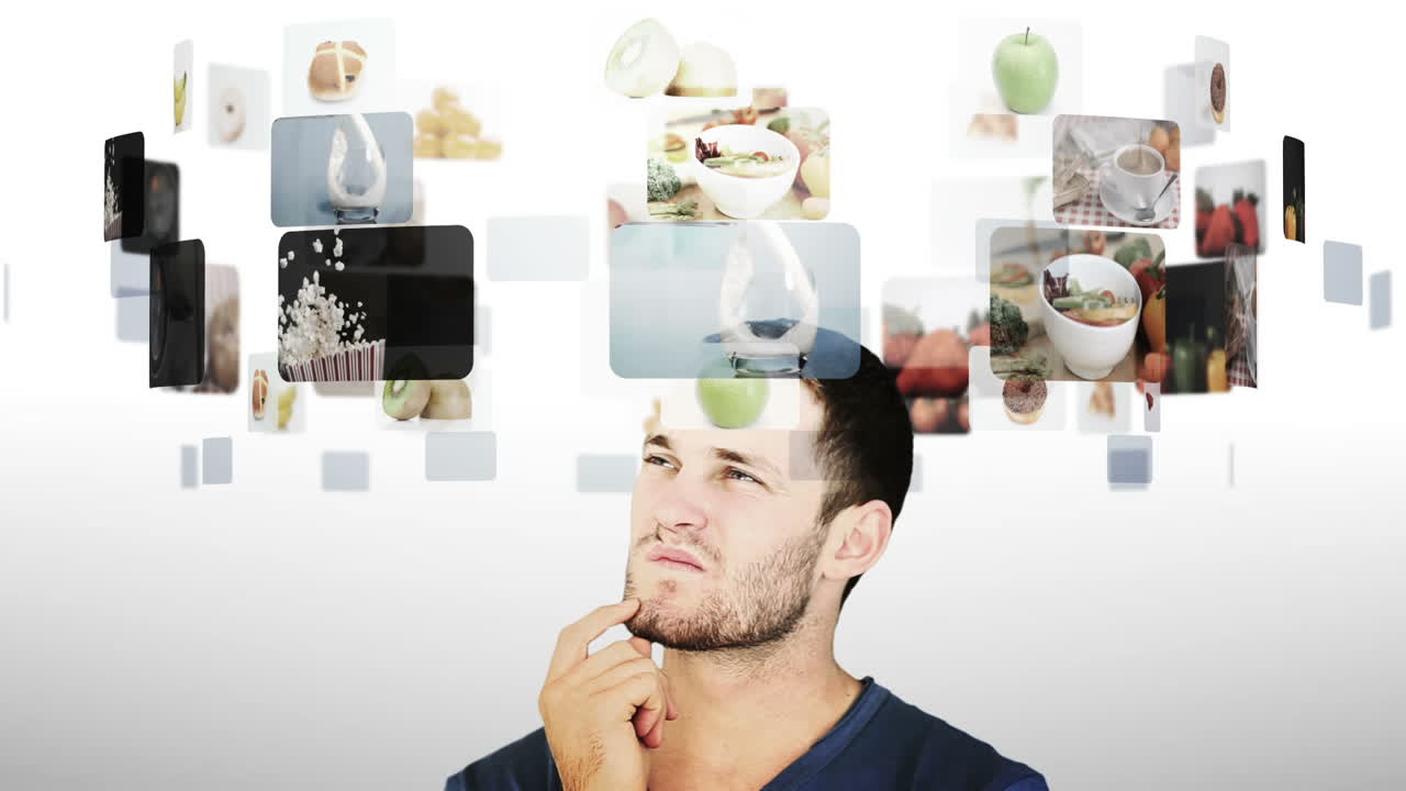 진지한 남자가 슬로우 모션 비디오를 보고 있습니다.