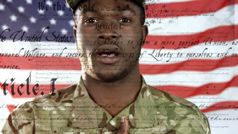 african american soldier hand on heart with us flag waving and constitution foreground