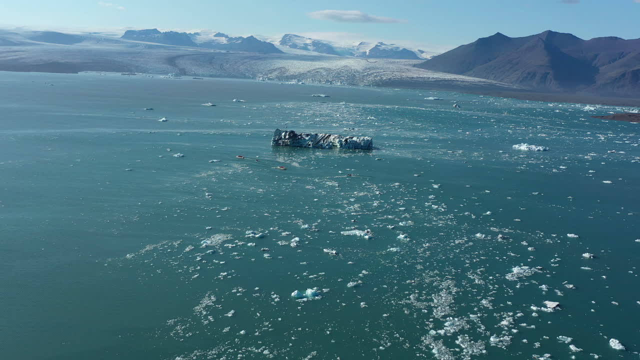 Icebergs and Boats in Jökulsárlón Glacier Lagoon, Iceland
