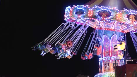 colorful carousel at night in a amusement park