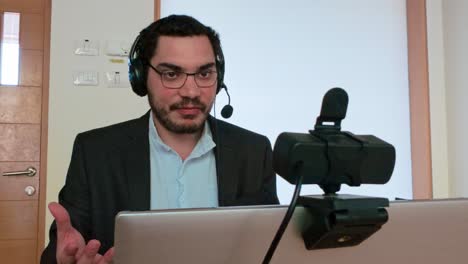 young man engaged in an e-learning webinar
