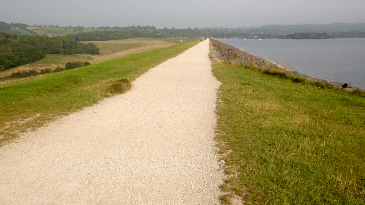 Looking up Carsington Water dam footpath from south end