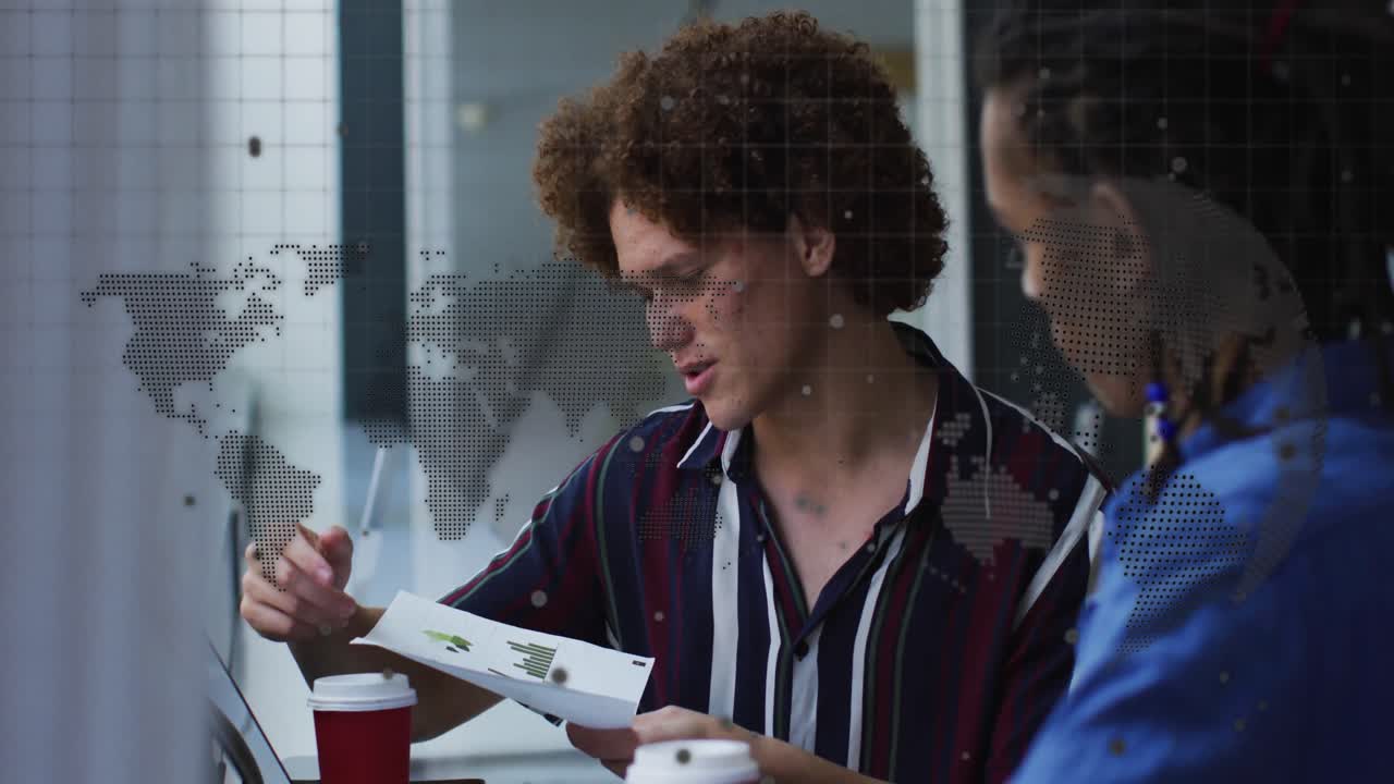 Animation of data processing and world map over diverse business people in office
