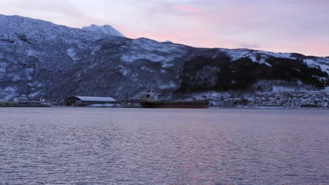 norwegian sea bay during polar night, narvik municipality in norway - panning shot