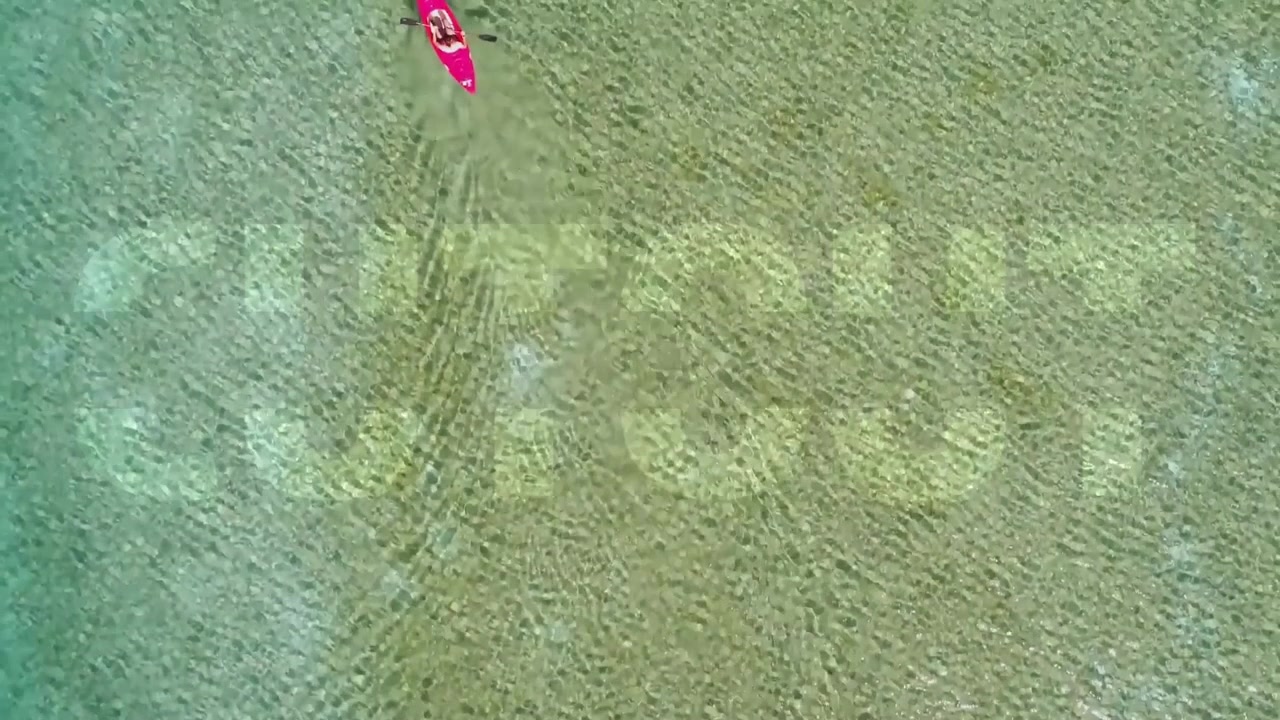Dynamic Cutout Text Animation with Water and Sky Reveals