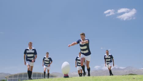 rugby players playing on field