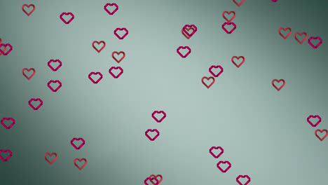 animación de corazones que se mueven sobre un fondo gris