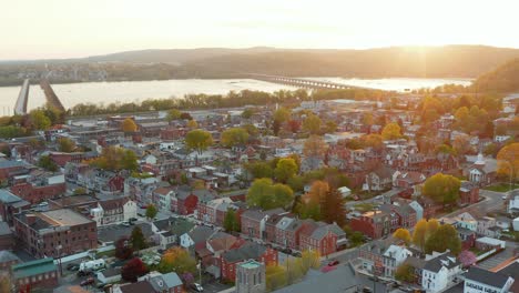 cinematic aerial of historic american city during spring sunset, sunrise