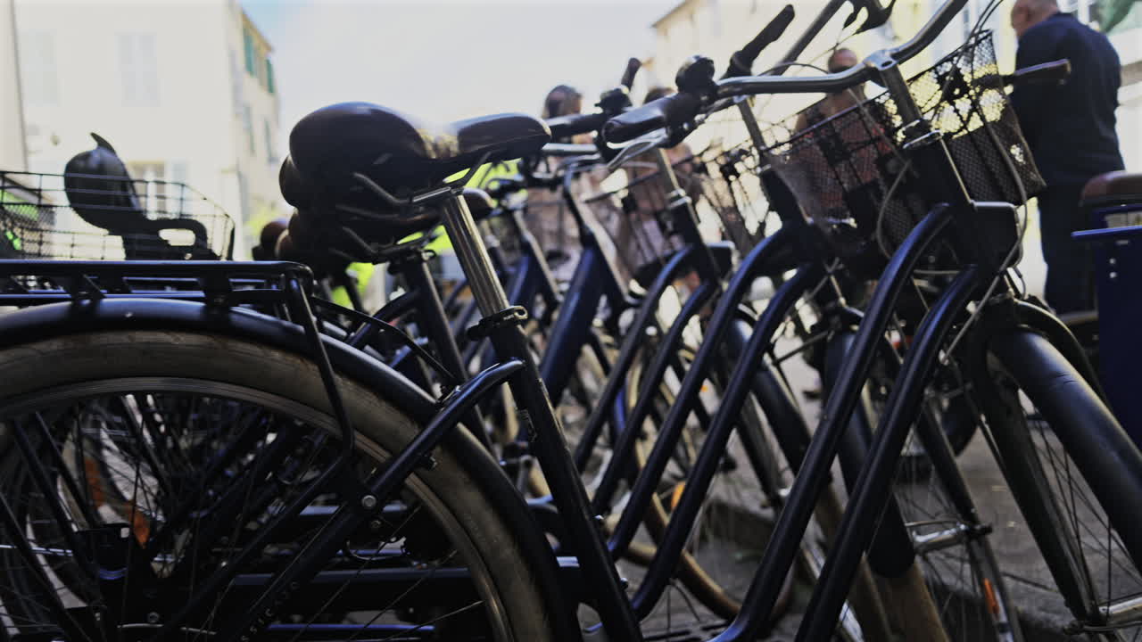 Close up of multiple bicycles parked on the street in Antibes, France