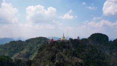 tiger cave temple sits atop a lush mountain in krabi, offering panoramic views and spiritual serenity