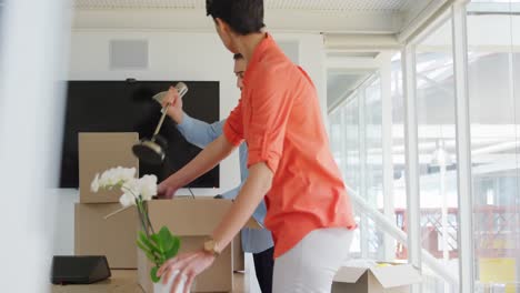 Young-man-and-woman-working-in-a-creative-office