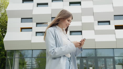 business woman using smartphone texting female executive checking emails browsing messages on mobile