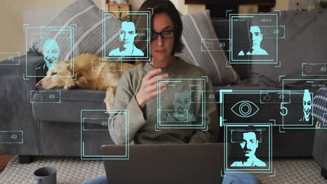 Facial-recognition-and-data-analysis-animation-over-woman-using-laptop-on-couch