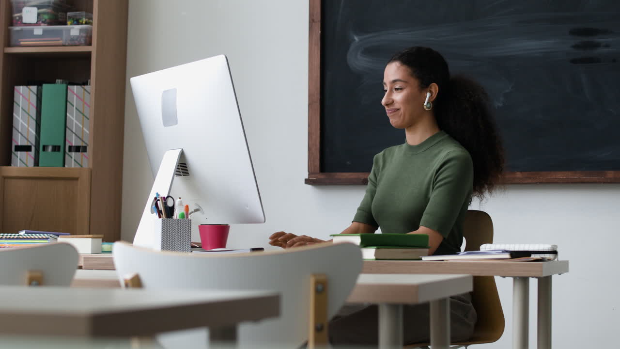 Teacher working online in a classroom