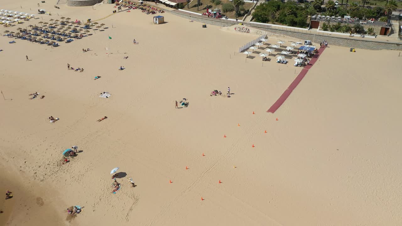 Aerial Drone Shot of the Carvelos Beach with accessibility for people with reduced mobility, near Lisbon, Portugal