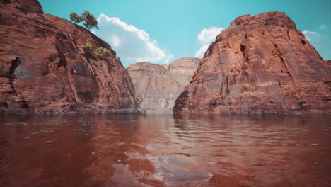 colorado river with gorgeous sandstone walls and canyons