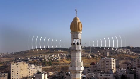 minarete de una mezquita en un paisaje urbano con ondas de radio