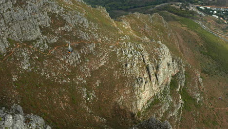 traveling cable car in table mountain, cape town, south africa