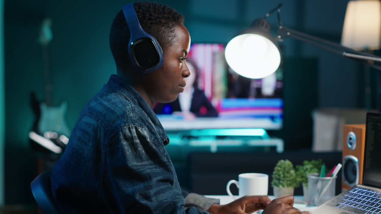 Woman Working Late at Night on Computer