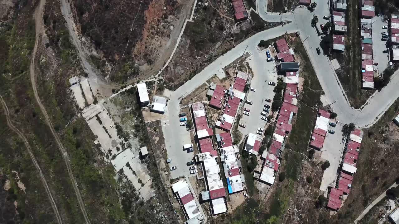 Aerial View of a Hillside Settlement