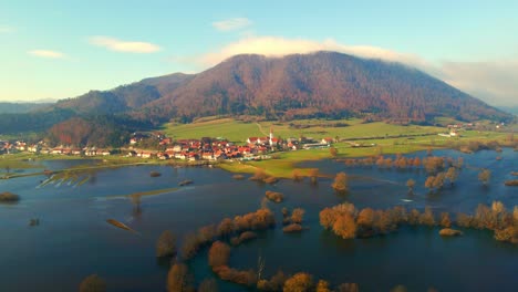 aerial 4k drone footage of a planina plain , slovenia