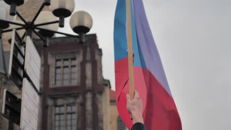 Czech-Republic-National-Flag-Waving-in-Hand-of-Man,-Close-Up-Slow-Motion