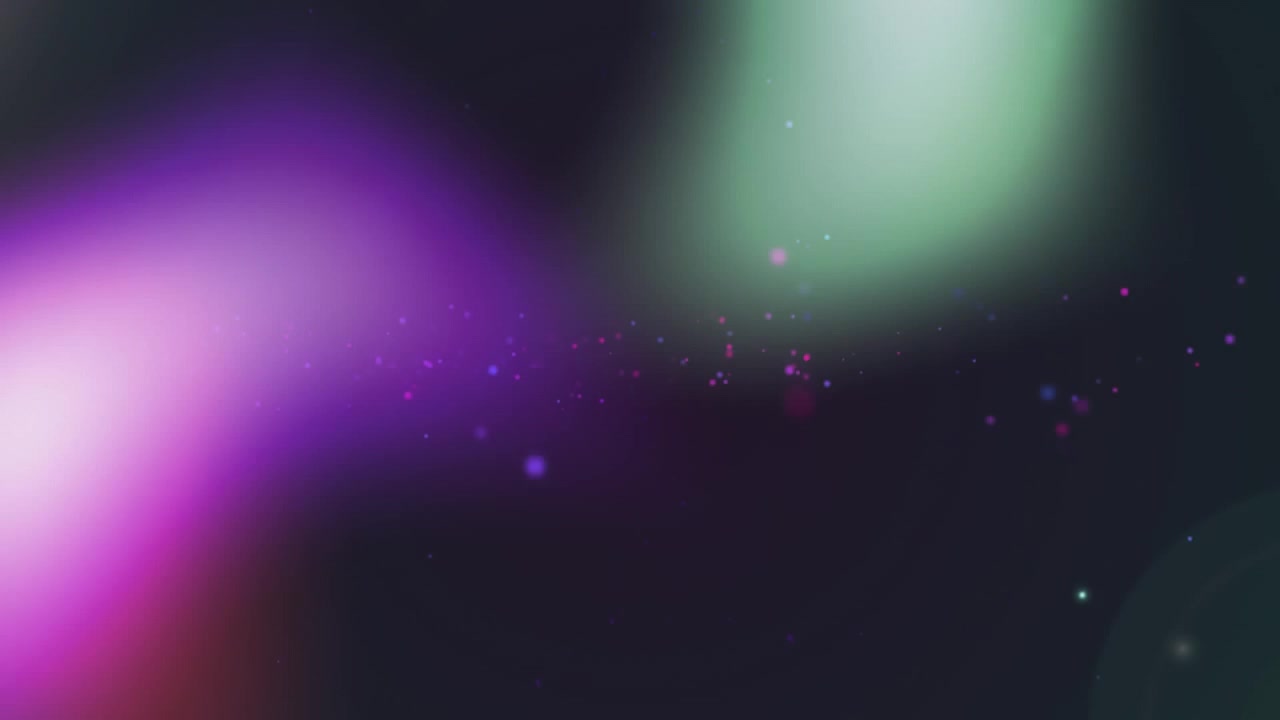 Animation of colourful particles and bokeh lights moving on black background
