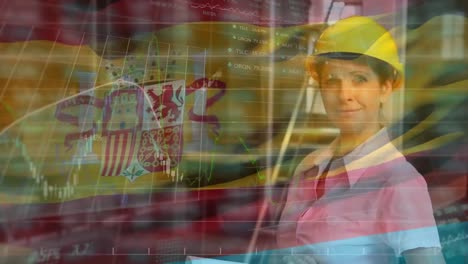 Spanish-flag-over-site-worker-working-on-plans.