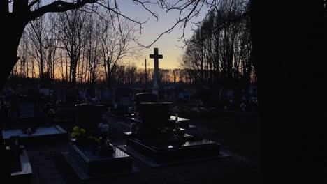 graveyard christian in evening with cross wide, mosonmagyarovar, hungary