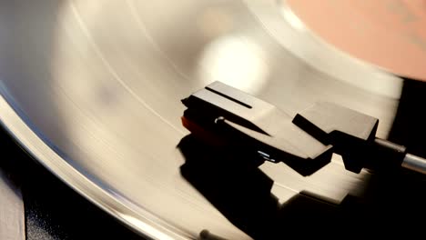 close up of vinyl record on dj turntable record player