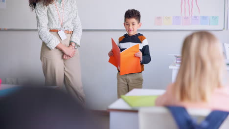 child, student and reading a book in class