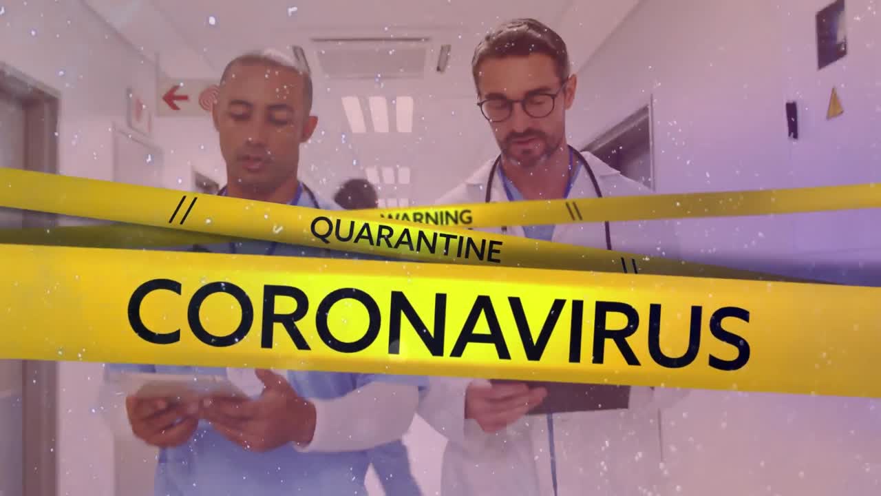 Yellow police tapes with Warning, Quarantine and Coronavirus text against doctors walking in hospita