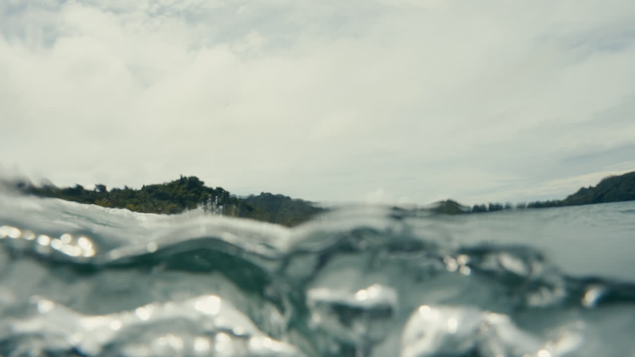 Ocean waves near a tropical beach