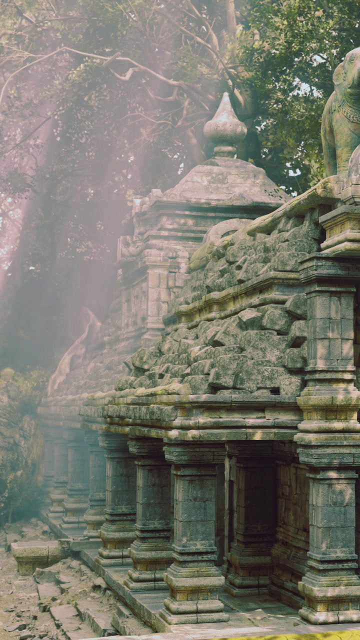 Ancient temple ruins shrouded in mist among lush greenery at dawn