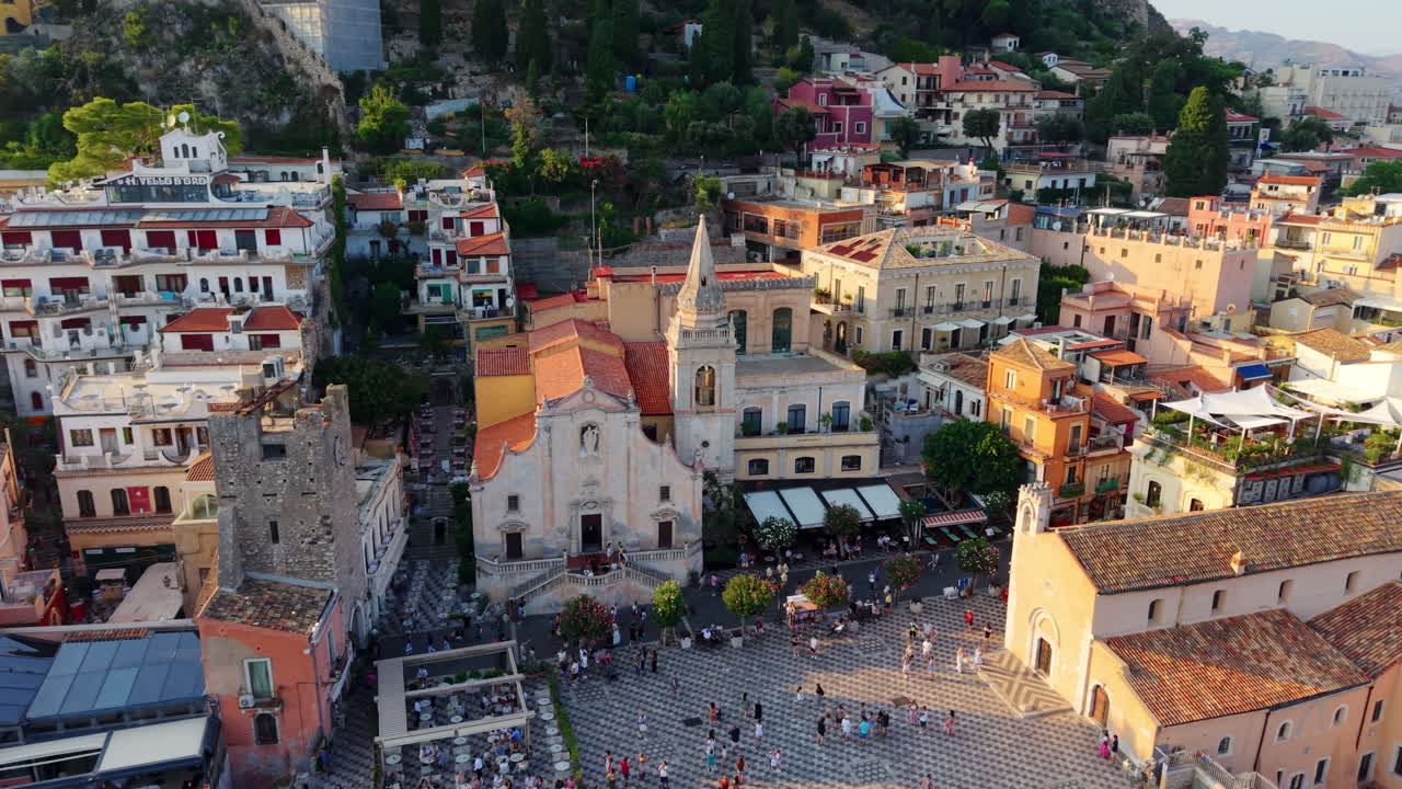 Aerial view of Taormina, Sicily's vibrant architecture and lively square