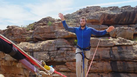 mountaineer starts walking on the tightrope 4k