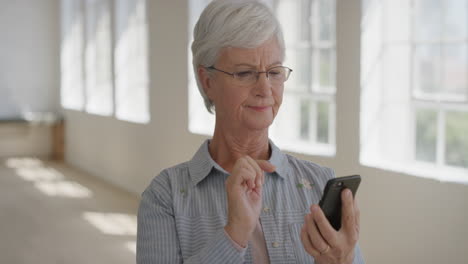 portrait-of-elderly-woman-using-smartphone-confused-frustrated-at-broken-mobile-phone-faulty-electronic-device