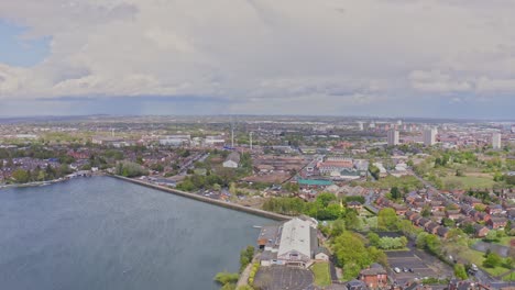 aerial drone shot of edgbaston reservoir, a nature reserve in birmingham, england