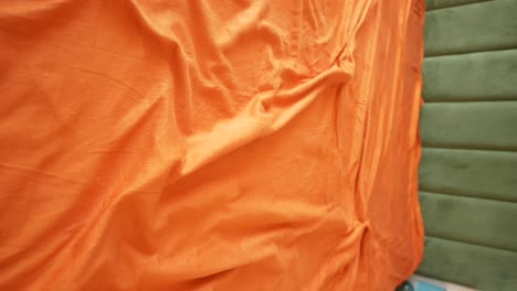 orange bed sheets