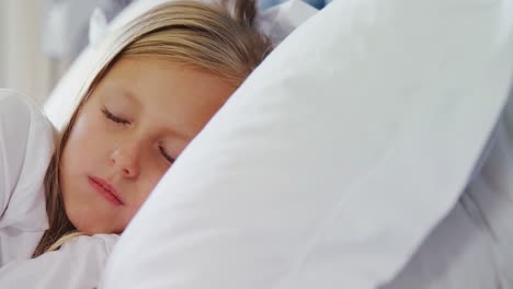 girl sleeping peacefully on bed 4k