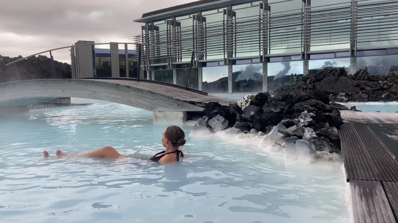 Young female model chilling inside Blue Lagoon geothermal spa