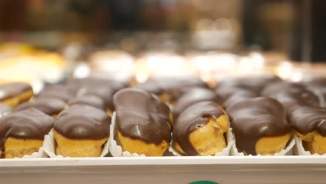 chocolate eclairs on display