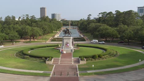 drone view of the sam houston statue in hermann park in houston, texas