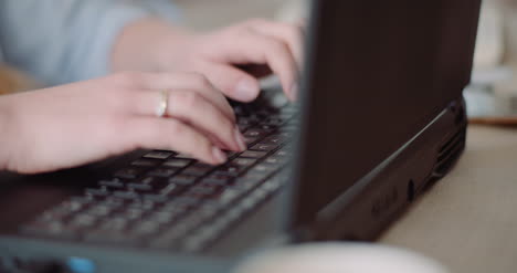 Young-Businesswoman-Typing-Response-To-Client-Email-Woman-Typing-On-Keyboard-2