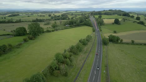 flying high over main road a66 cutting through green summer landscape