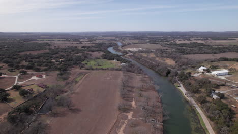 wide aerial view of the blanco river outside of blanco, texas in the winter
