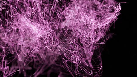 Purple-lights-trails-moving-against-black-background