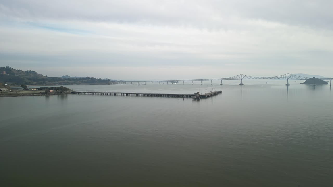 Captivating drone footage of the Richmond–San Rafael Bridge and the surrounding landscape of Point Molate.